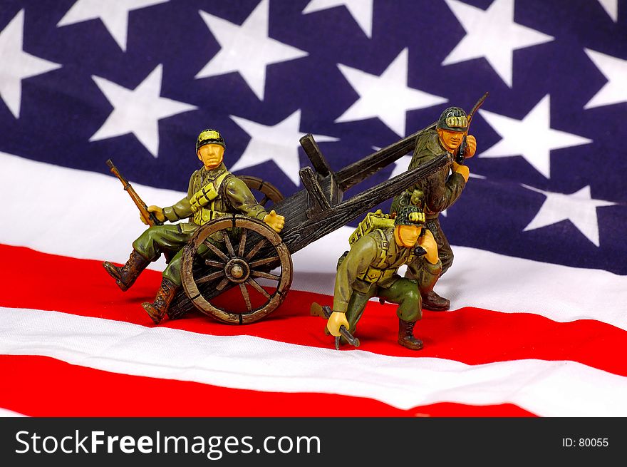 Toy Soldiers With American Flag in Background. See Portfolio For Similar Concepts. Toy Soldiers With American Flag in Background. See Portfolio For Similar Concepts