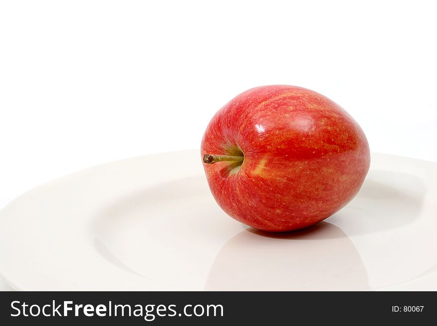 Red Apple On White Plate