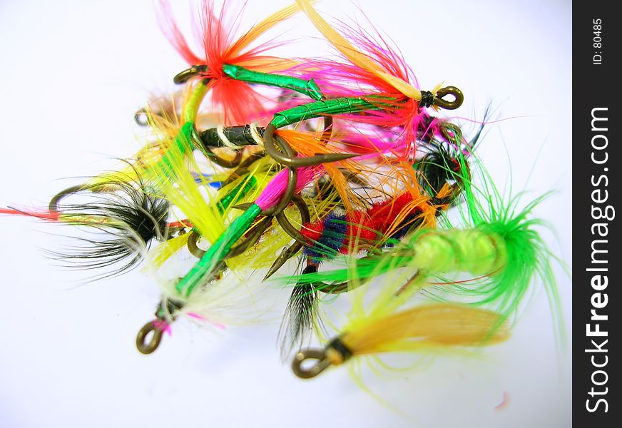 Macro image of a group of custom hand-tied trout flies. Macro image of a group of custom hand-tied trout flies.