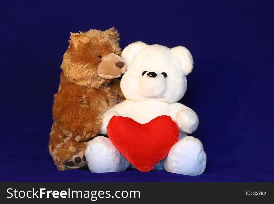 Brown and white teddy bears. Could be used where inter racial love/marriage related materials. Brown and white teddy bears. Could be used where inter racial love/marriage related materials.