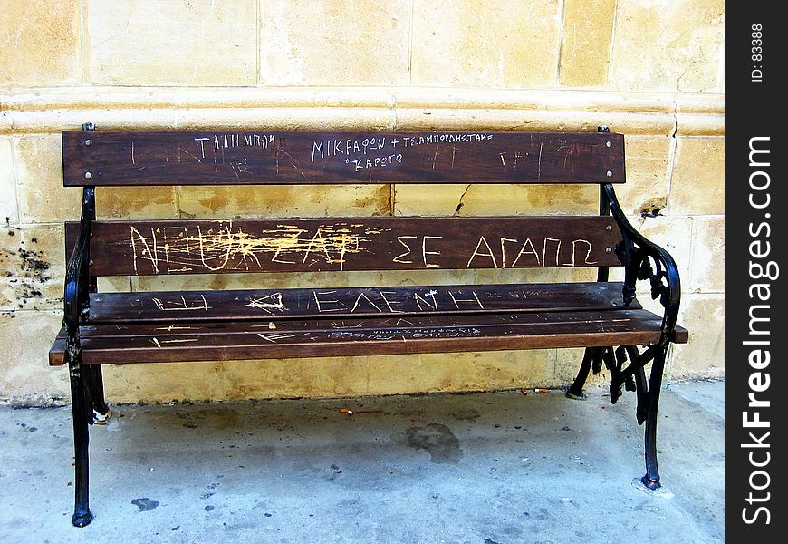 Words written on a bench. Picture taken in Nicosia, Cyprus. Words written on a bench. Picture taken in Nicosia, Cyprus