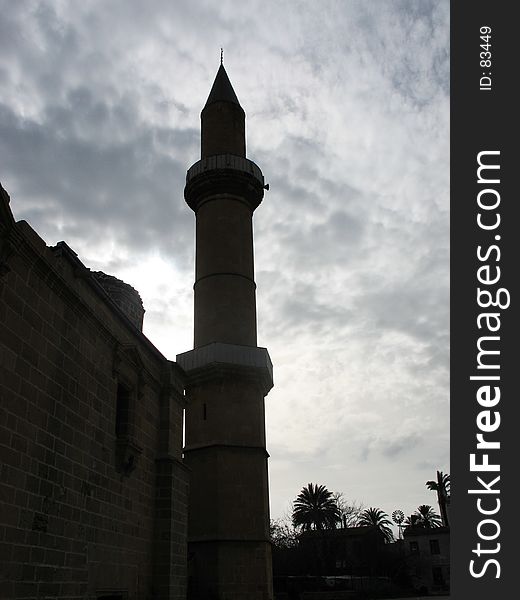 The tower of a mosque hiding the sun. Nicosia. Cyprus. The tower of a mosque hiding the sun. Nicosia. Cyprus