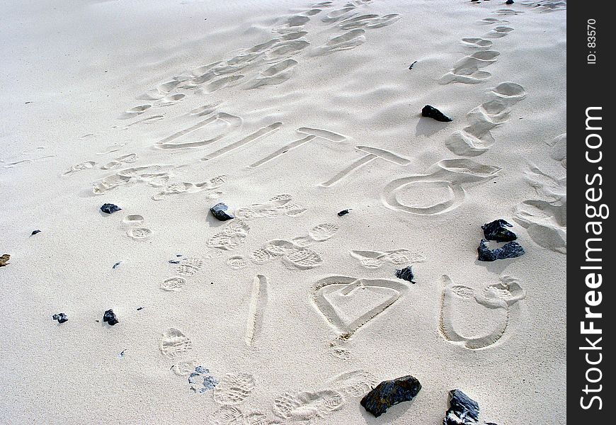 I love you in wrighten in sand. I love you in wrighten in sand