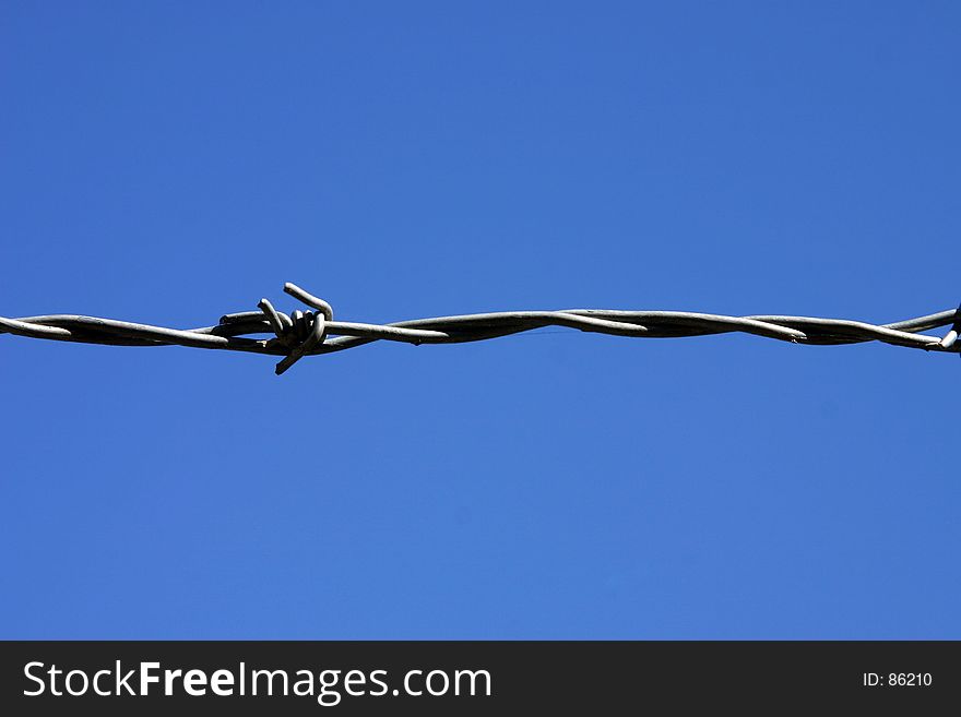 One strand of barbed wire.