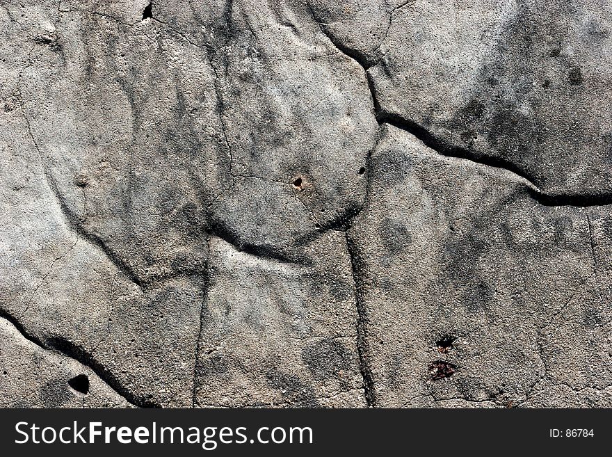 Close up of cracks in concrete wall. Close up of cracks in concrete wall.