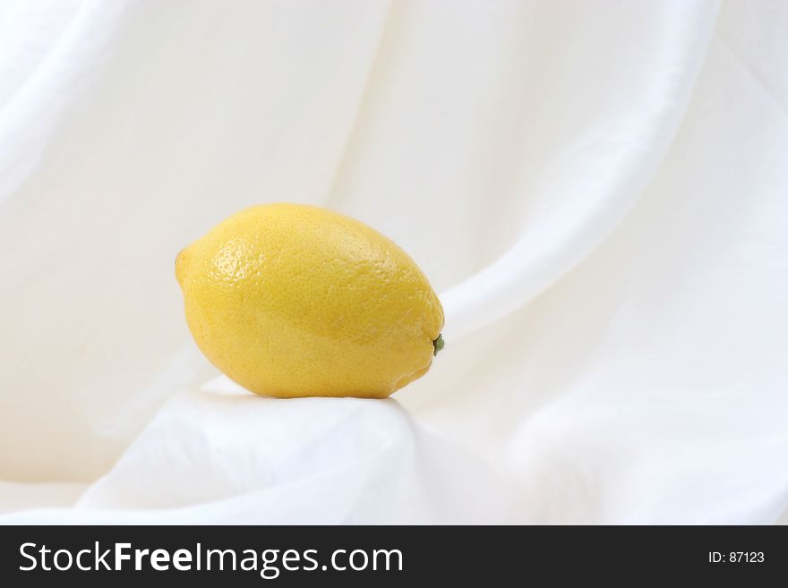 Lemon on silk backdrop