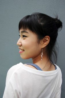 Attractive Young Korean Woman With Her Head Turned Royalty Free Stock Photo