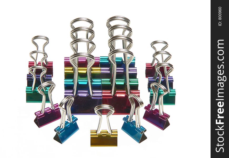 A group of colored paperclips in formation. A group of colored paperclips in formation