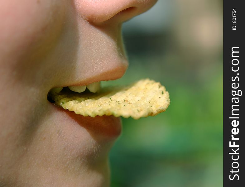 Chips in a mouth