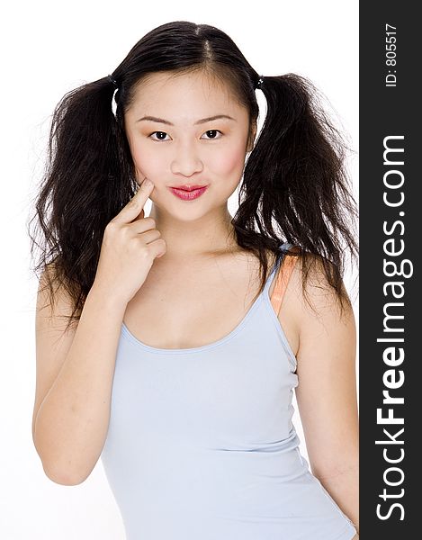 A young cute asian woman with bunches. A young cute asian woman with bunches