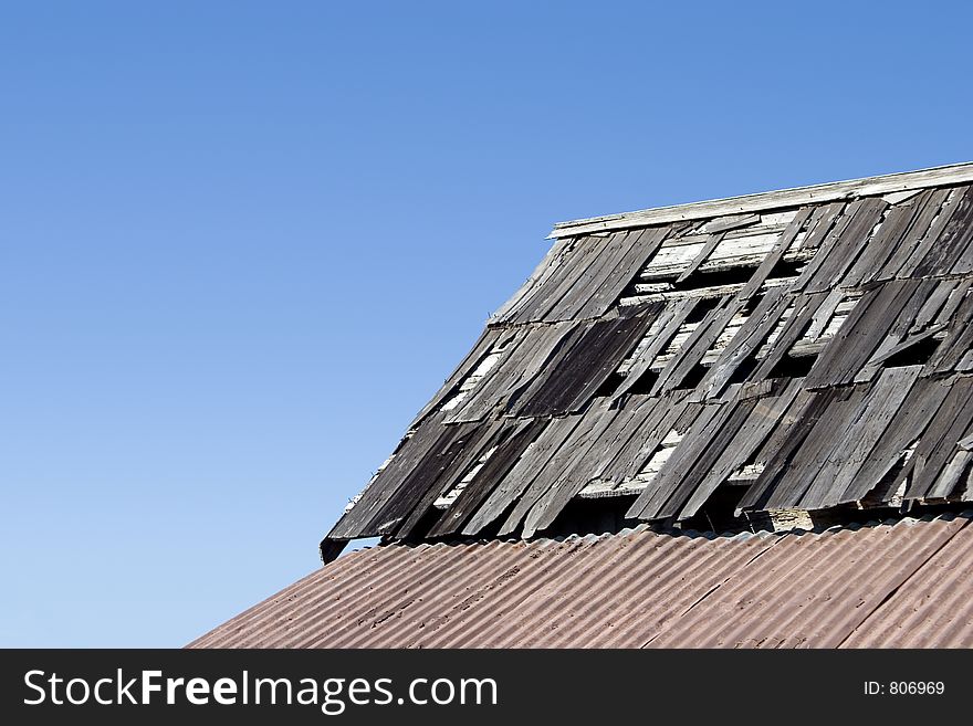 A battered and worn roof. A battered and worn roof.