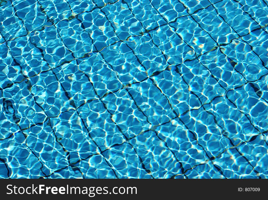 Bottom of a brand new swimming pool on a sunny summer day. Bottom of a brand new swimming pool on a sunny summer day