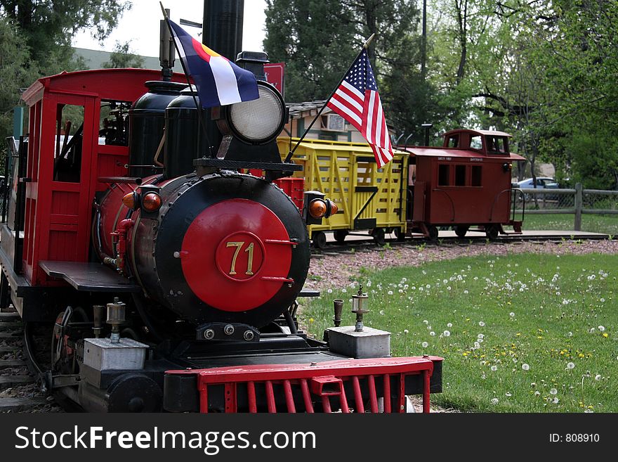 A kiddie train at a park