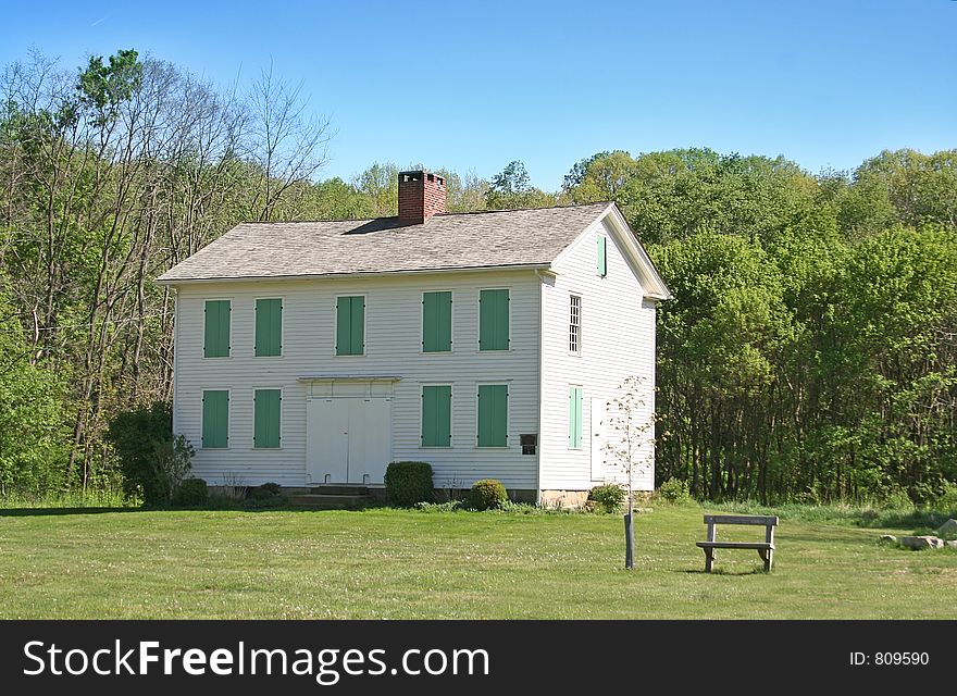 A historical home moved to a public park for restoration and preservation. A historical home moved to a public park for restoration and preservation.