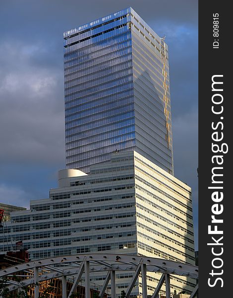 New manhattan office building at dusk - wtc area re-building. New manhattan office building at dusk - wtc area re-building