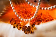 Costume Jewellery - Amber And Pearls. Royalty Free Stock Image
