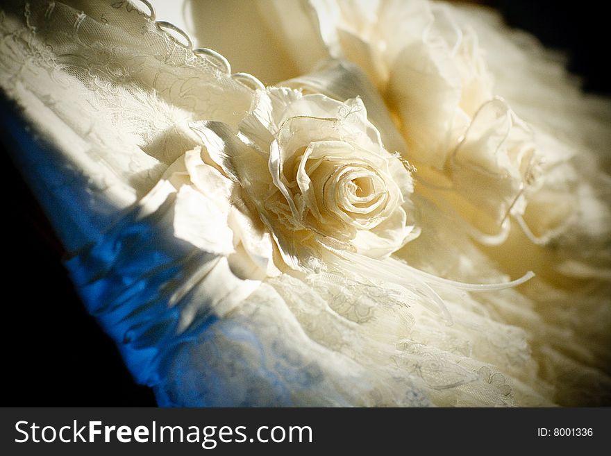 Artificial flowers og the weddding dress. Artificial flowers og the weddding dress