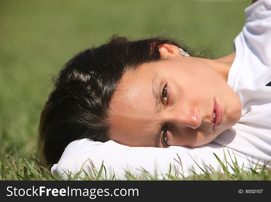 Sweet woman rest on the grass. Sweet woman rest on the grass