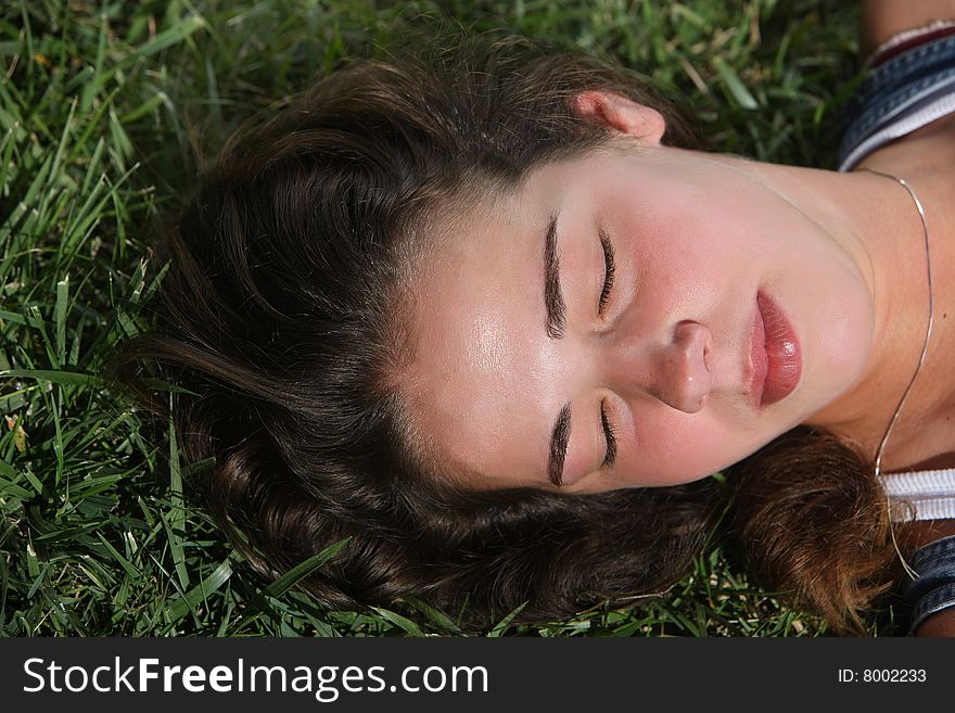 Sweet woman rest on the grass. Sweet woman rest on the grass