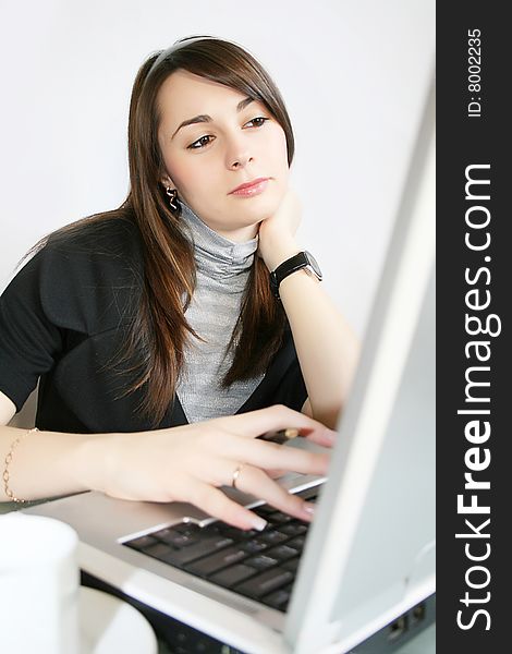 Young businesswoman, secretary or student with laptop