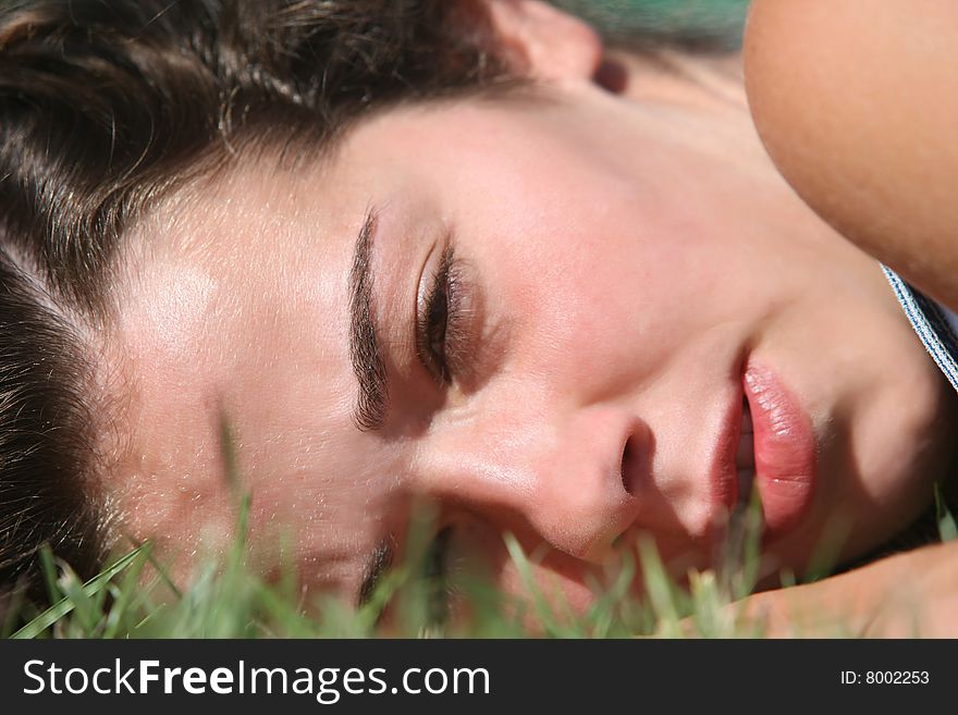 Sweet woman rest on the grass. Sweet woman rest on the grass