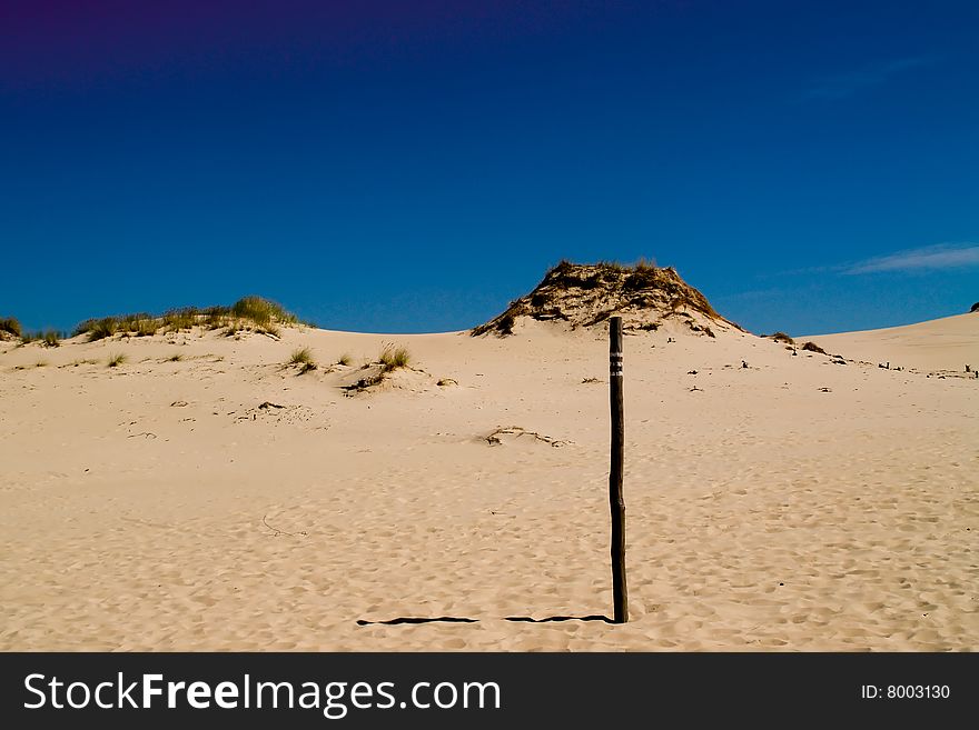 Photo of sand dunes on a sunny day