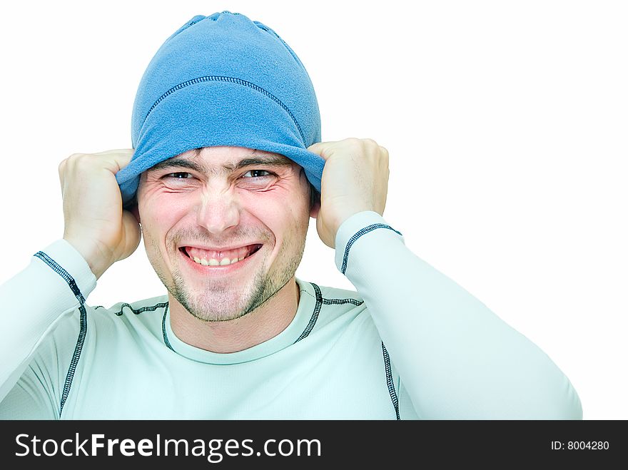 Young man in sport cap and sweater on white. Young man in sport cap and sweater on white
