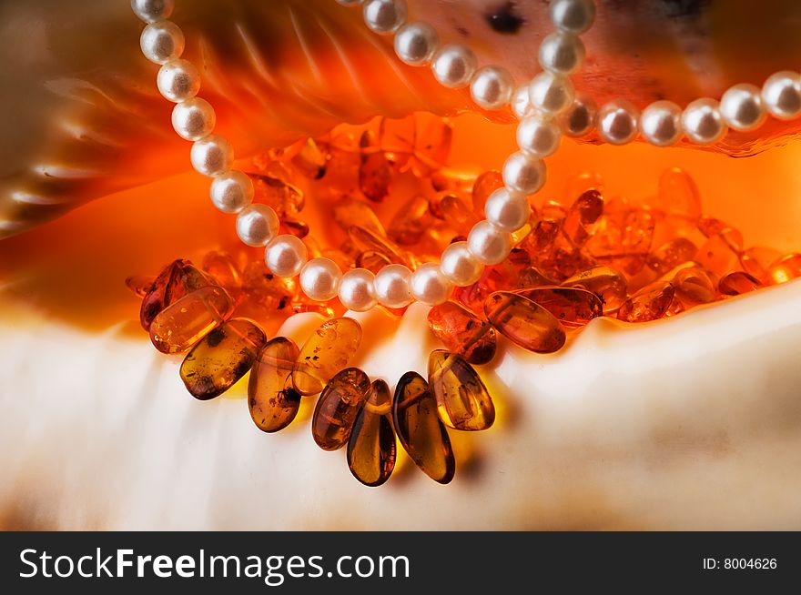 Costume jewellery - amber and pearls.