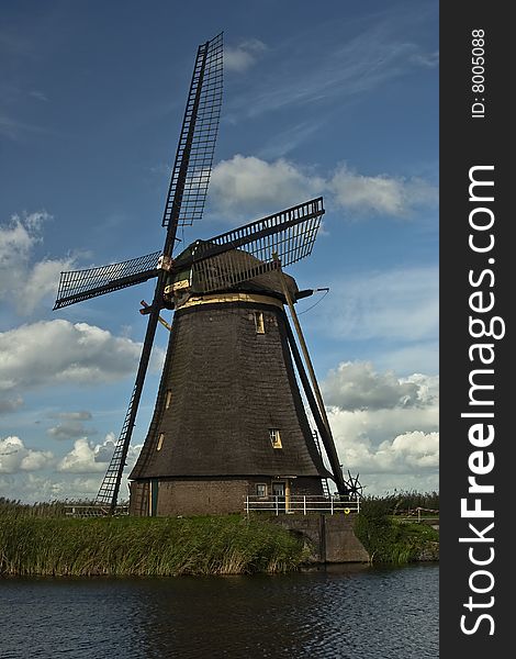 Vertical windmill picture at Kinderdijk, Holland.