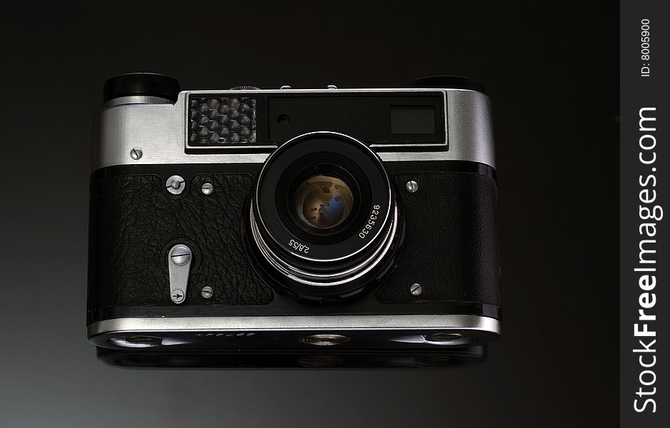 Vintage SLR camera in black and silver colors. Vintage SLR camera in black and silver colors