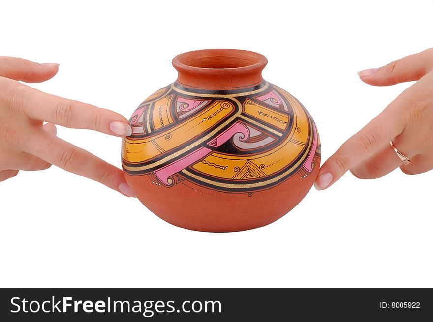 Hands holding handmade rare vase isolated on the white background