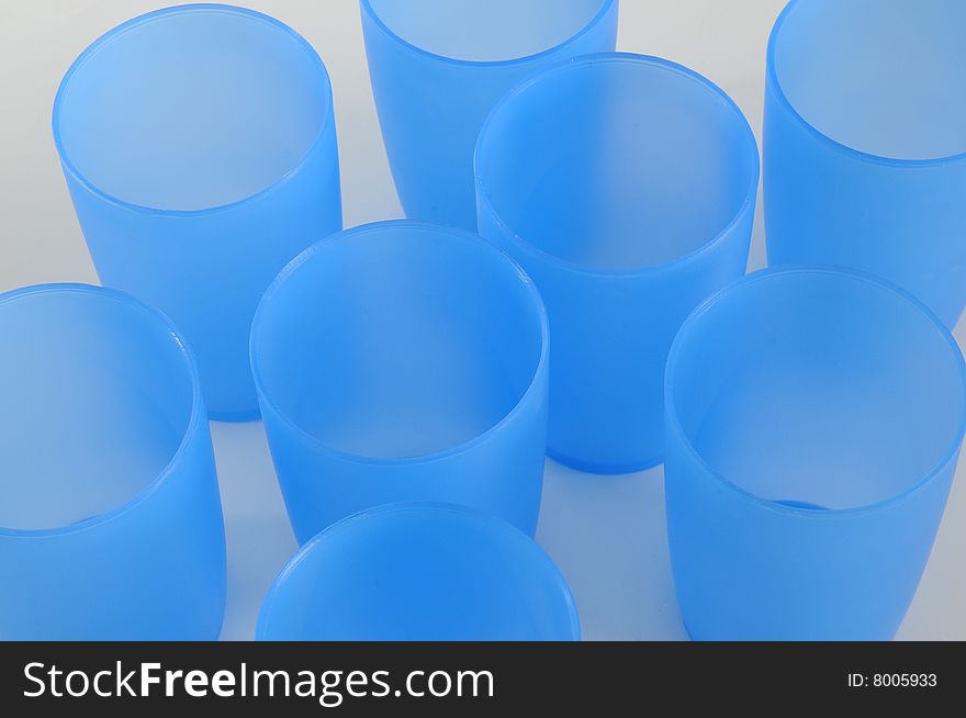 Some transparent plastic beaker,blue color.