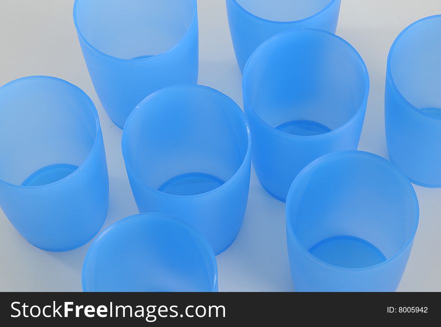 Some transparent plastic beaker,blue color.