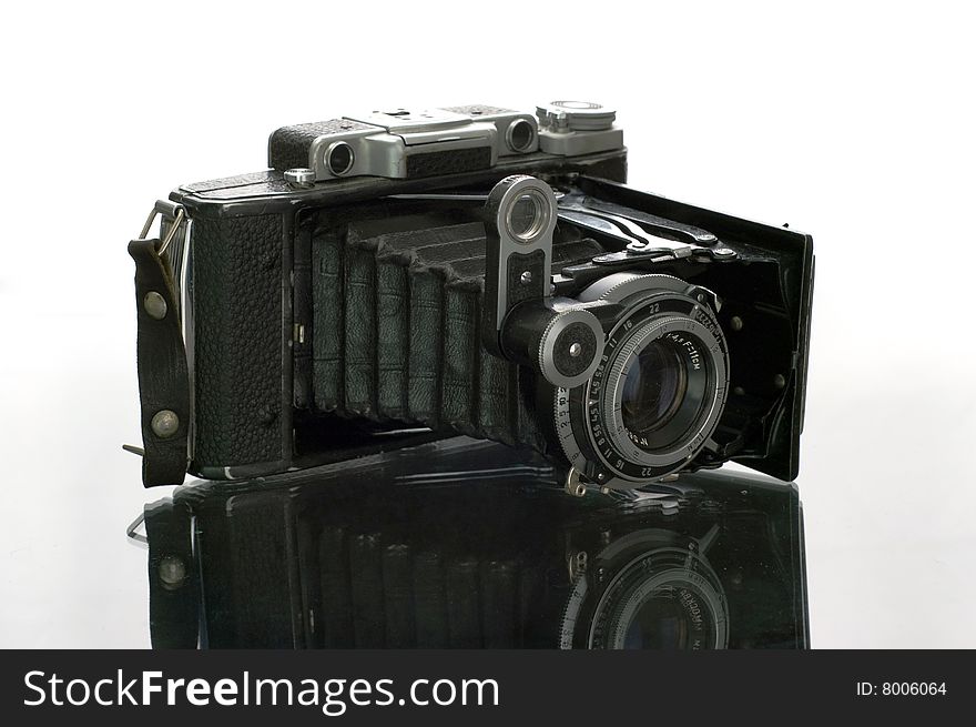 The ancient camera on a white background. The ancient camera on a white background