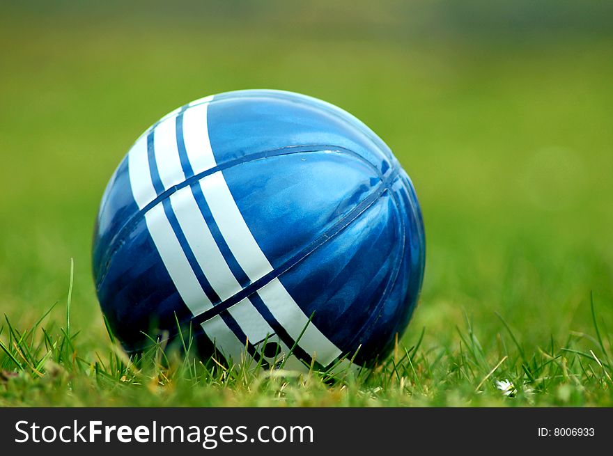 blue ball in the grass