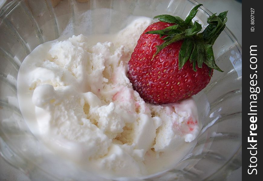 Appetizing strawberry with vanilla ice-cream. Appetizing strawberry with vanilla ice-cream