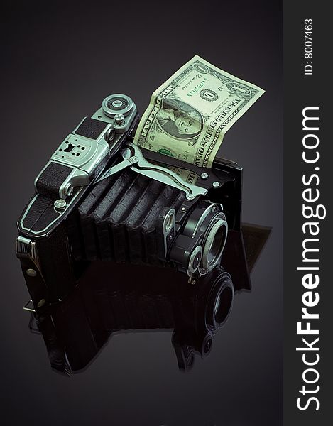 Conceptual of the money that can be made with photography. Conceptual of the money that can be made with photography