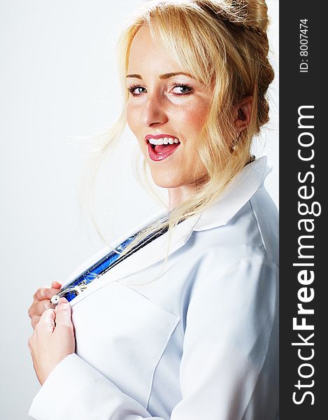 Happy smiling healthcare professional against a white background.