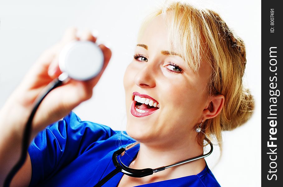 Happy smiling healthcare professional against a white background.