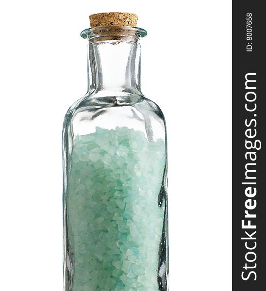 Colored bath salt against a white background.