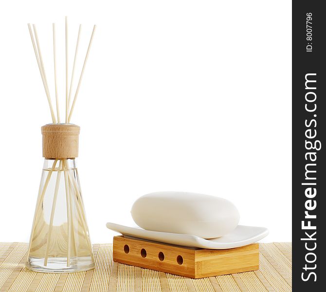 Reed diffuser and soap against a white background. Reed diffuser and soap against a white background.