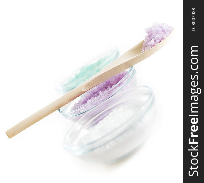 Colorful bath salt displayed against a white background.