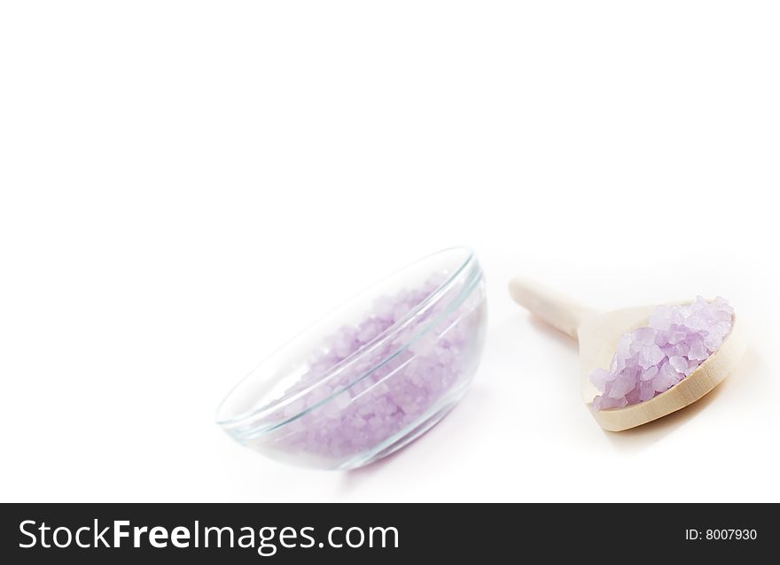 Colorful bath salt displayed against a white background.
