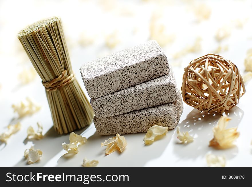 Brightly lit Pumice Stone Spa Display on White