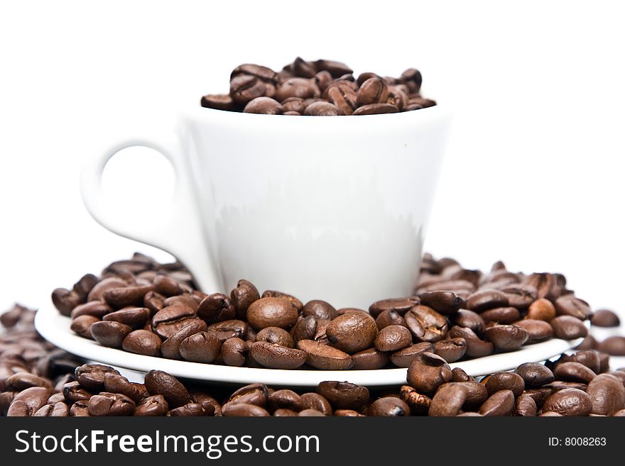 Cup  filled with coffee beans. Cup  filled with coffee beans