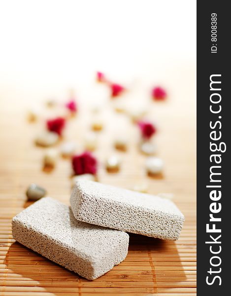 Pumice stones on top of a bamboo mat. Pumice stones on top of a bamboo mat.