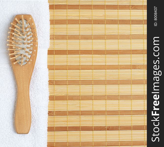 Brightly lit spa display on top of a bamboo mat.