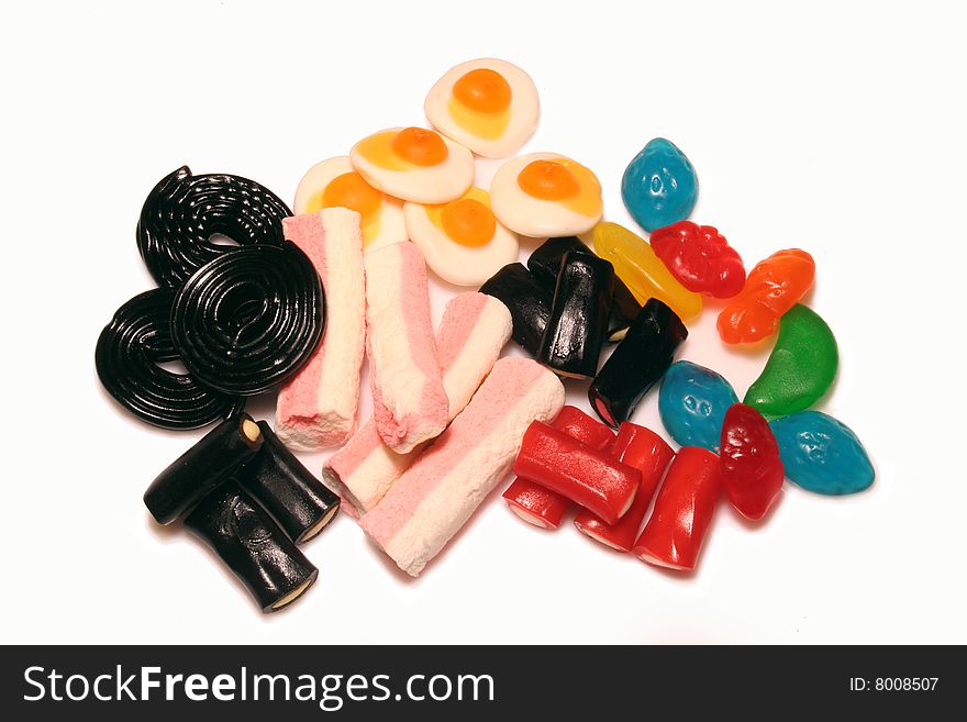 Colored candies on white background. Colored candies on white background