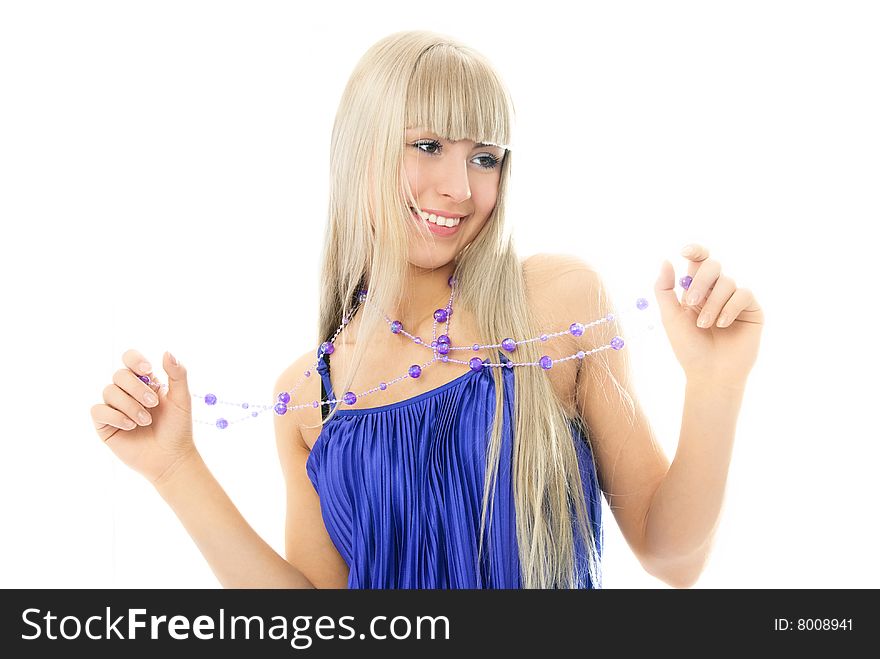 Beautiful young blond woman wearing beads and a purple dress