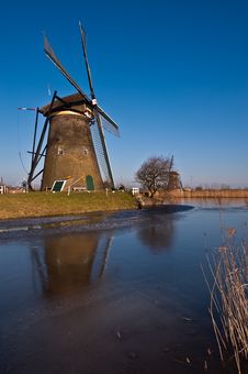 Beautiful Windmill Landscape At Kinderdijk Royalty Free Stock Photos